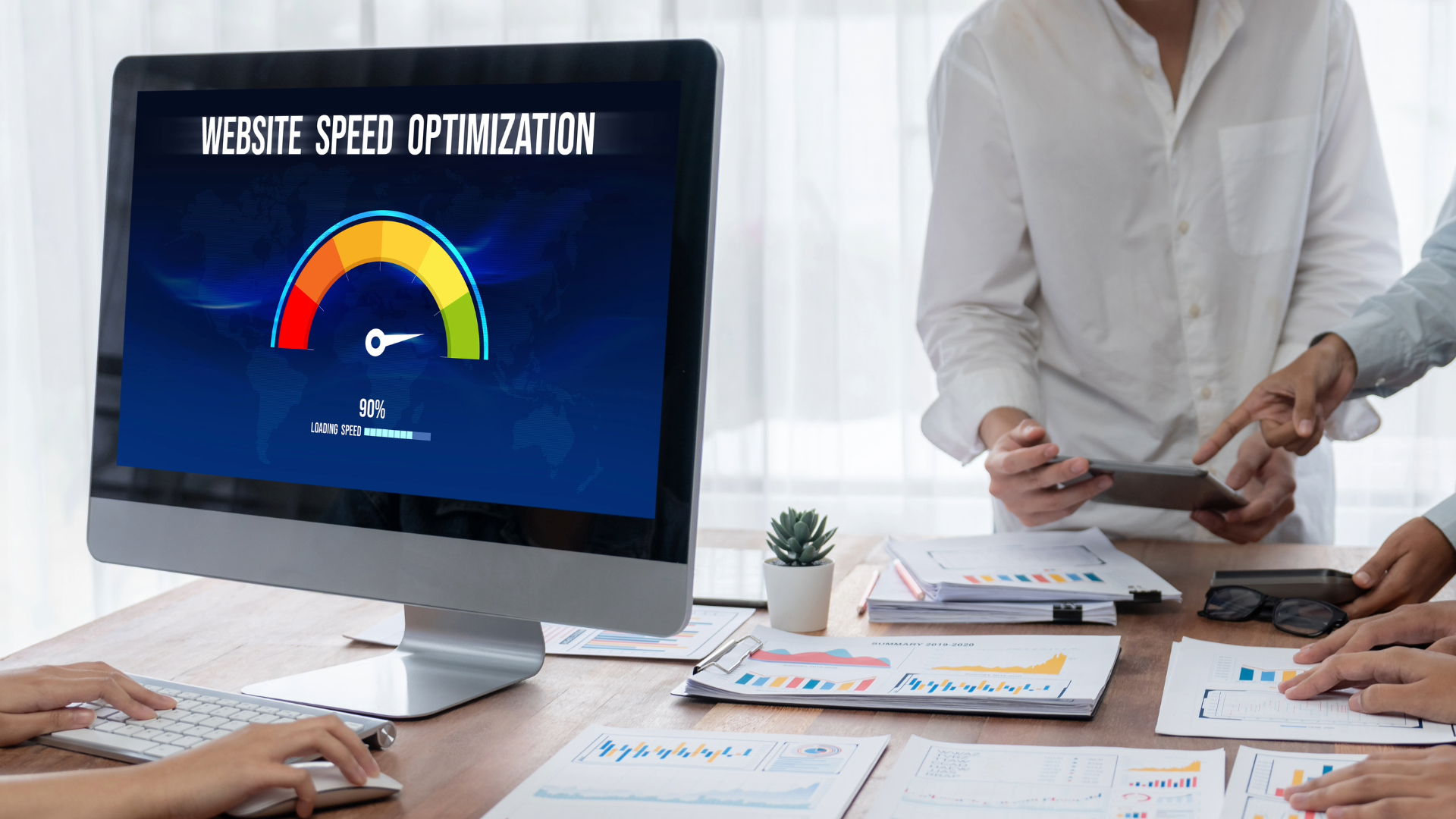 A computer monitor displays a website speed analysis.